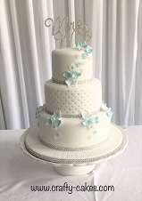 3 tier wedding bling white & blue flowers